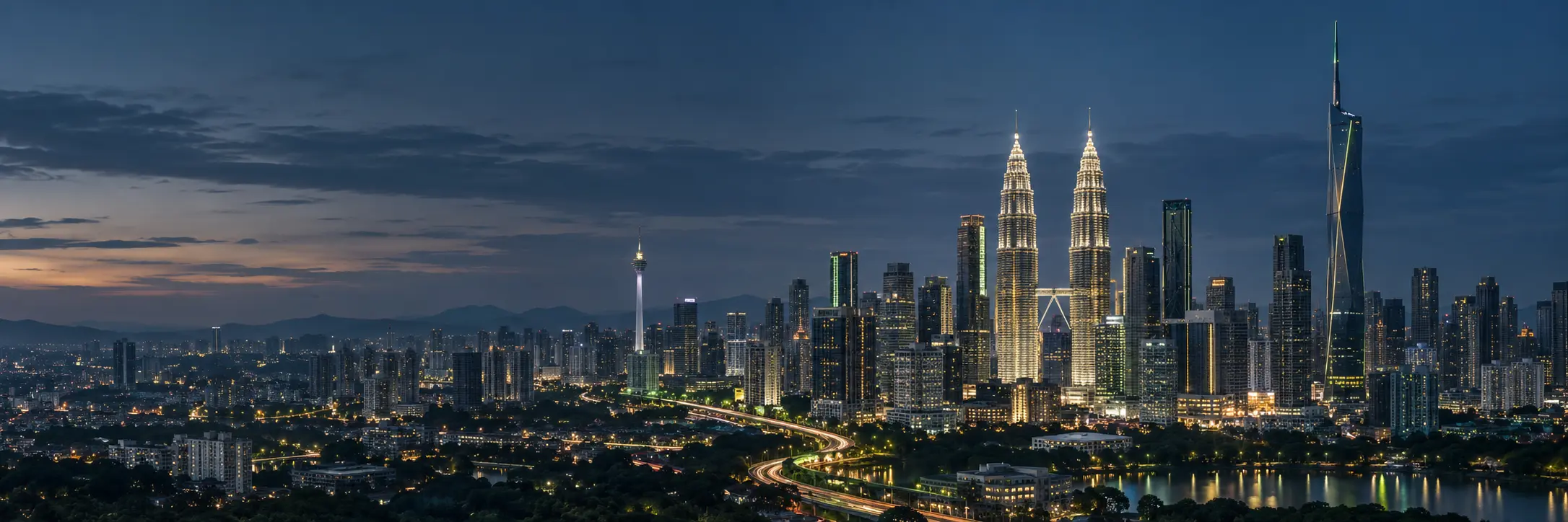 A cinematic blue-hour view of the Kuala Lumpur skyline, including the Petronas Twin Towers and Merdeka 118
